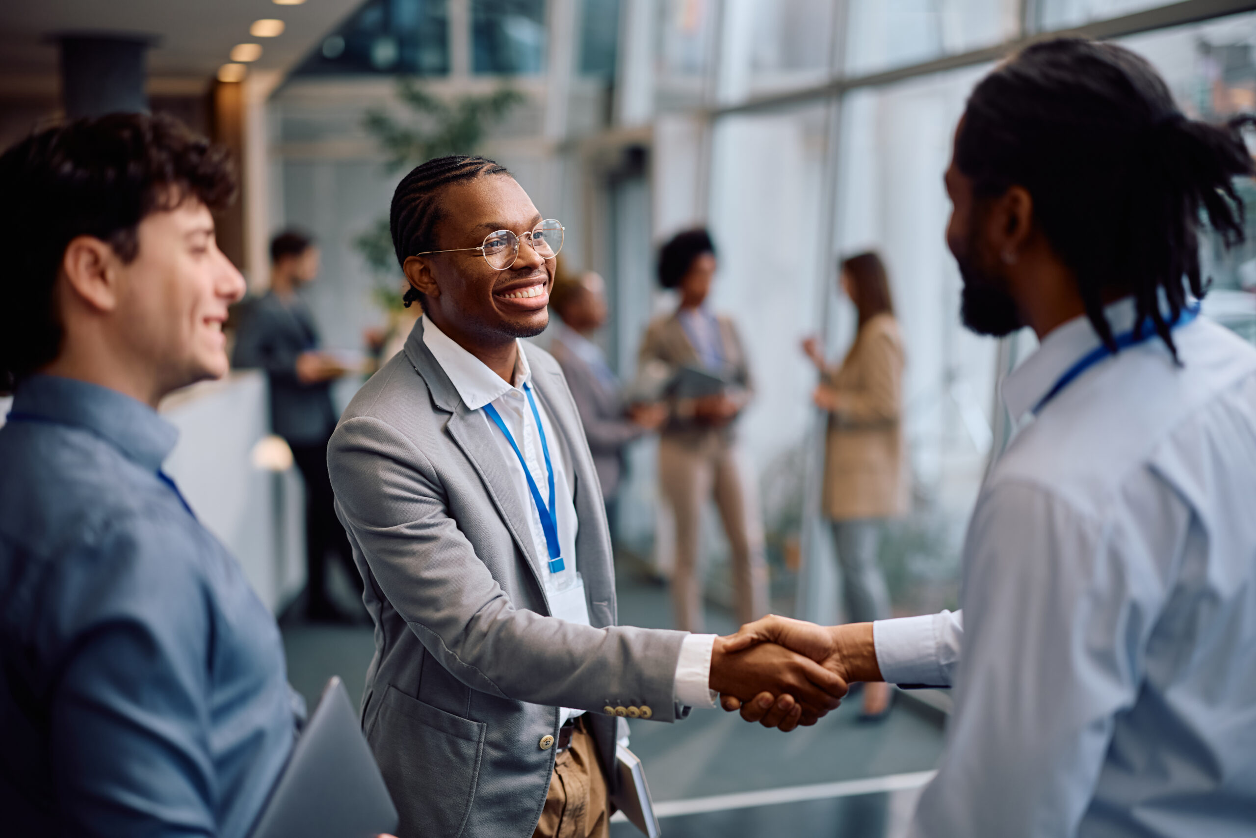 A friendly business interaction during a door-to-door sales conversation focused on building genuine customer connections.